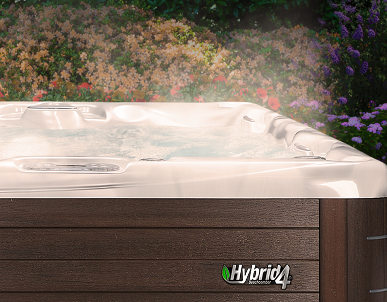 beachcomber hot tub filled with water with a backyard background