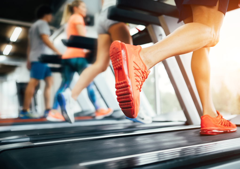 exercise for stress management, people on treadmills in gym