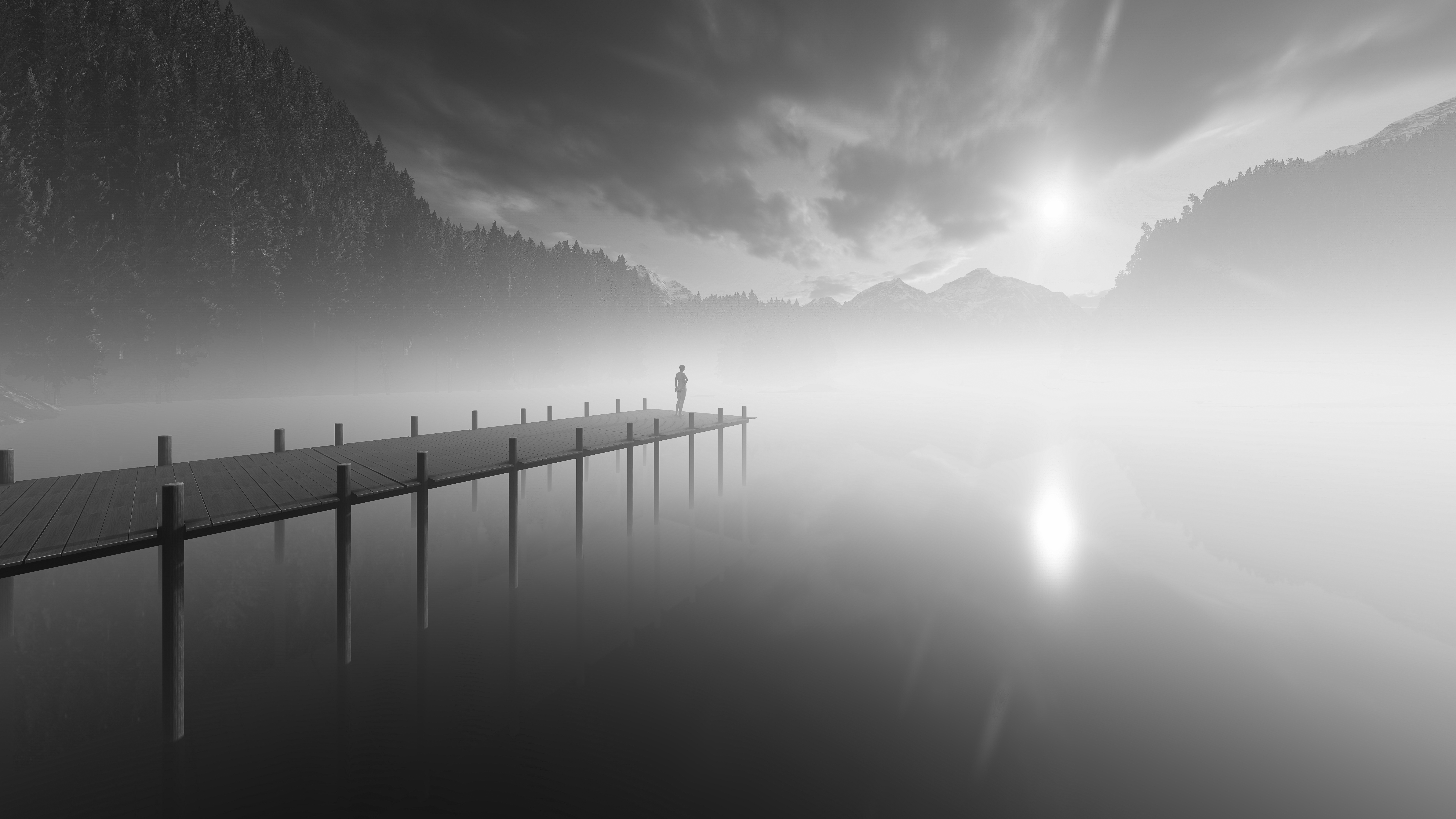 dark dock covered in clouds with silhouette of a person on the end