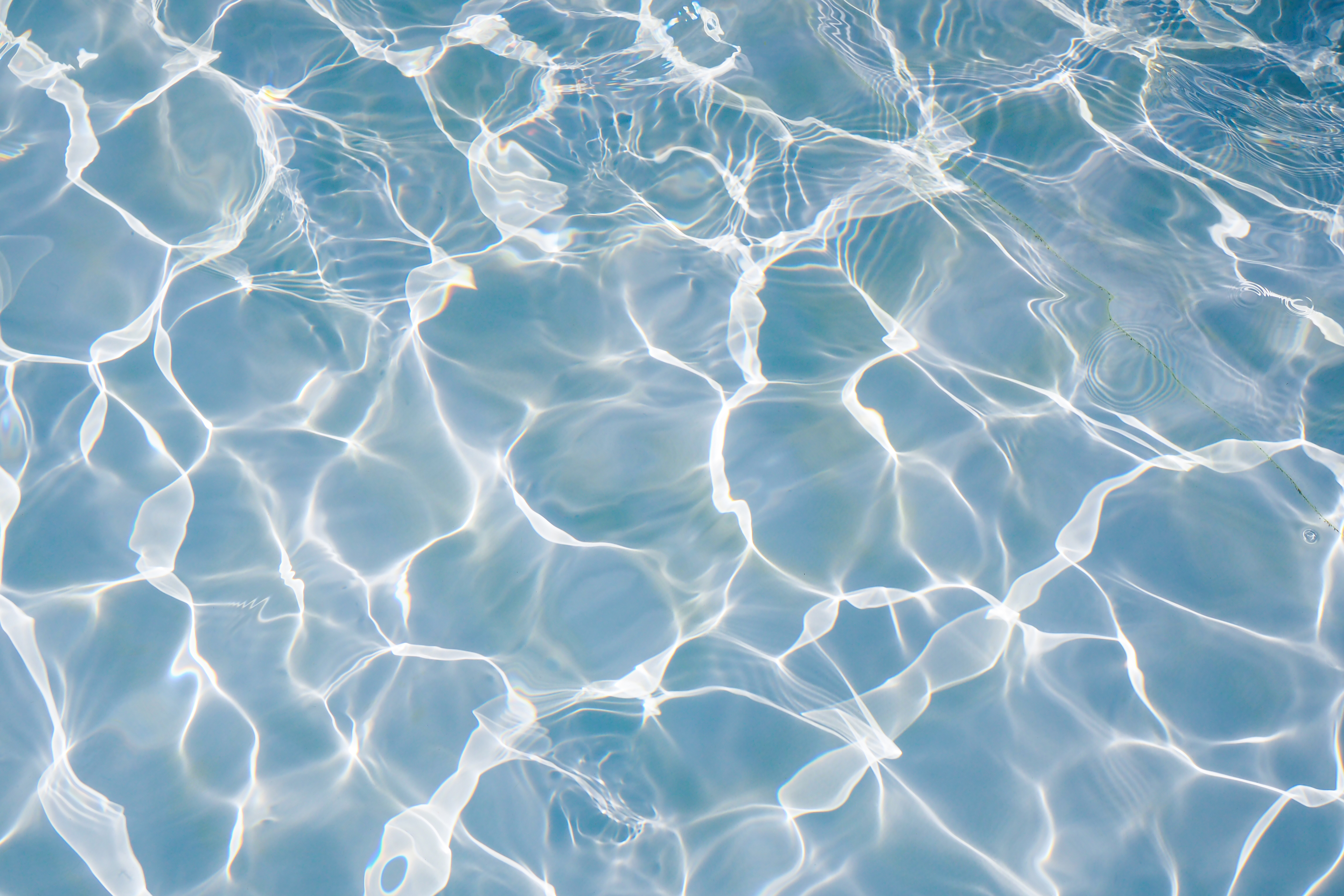 clear water with light reflections throughout