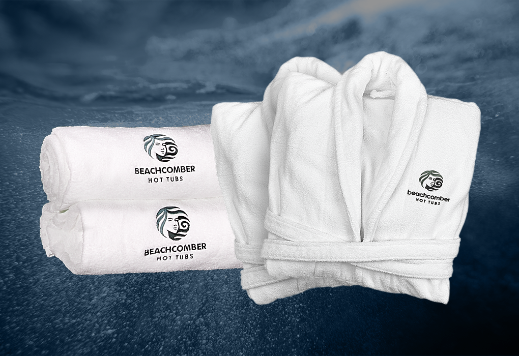 beachcomber hot tubs embroidered white towels and white robes 