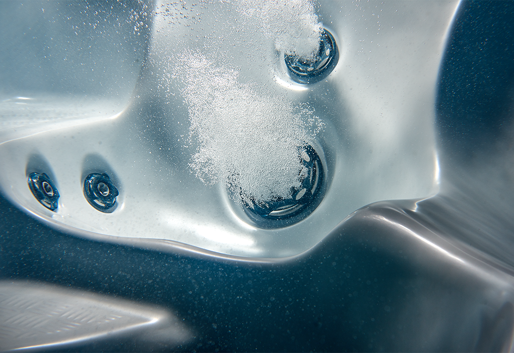 inside of beachcomber hot tub with jets