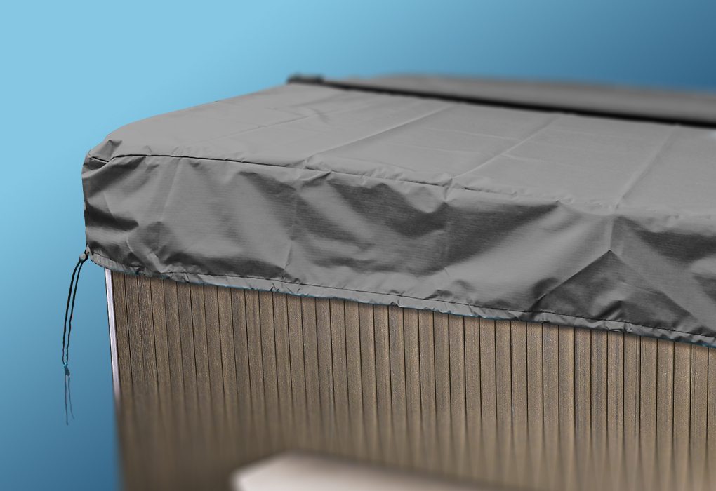 beachcomber hot tub with black cover cap covering it