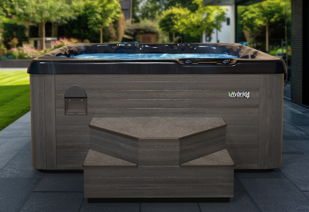 beachcomber hot tub with marquina acrylic in backyard